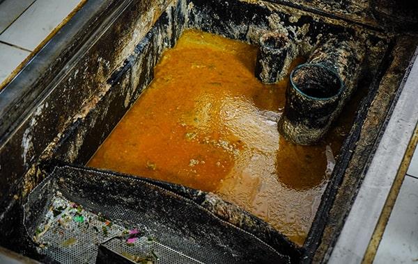 grease trap cleaning helps prevent grease and oil from entering the sewer system, hence reducing the risk of environmental contamination